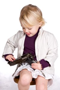 child with pistol